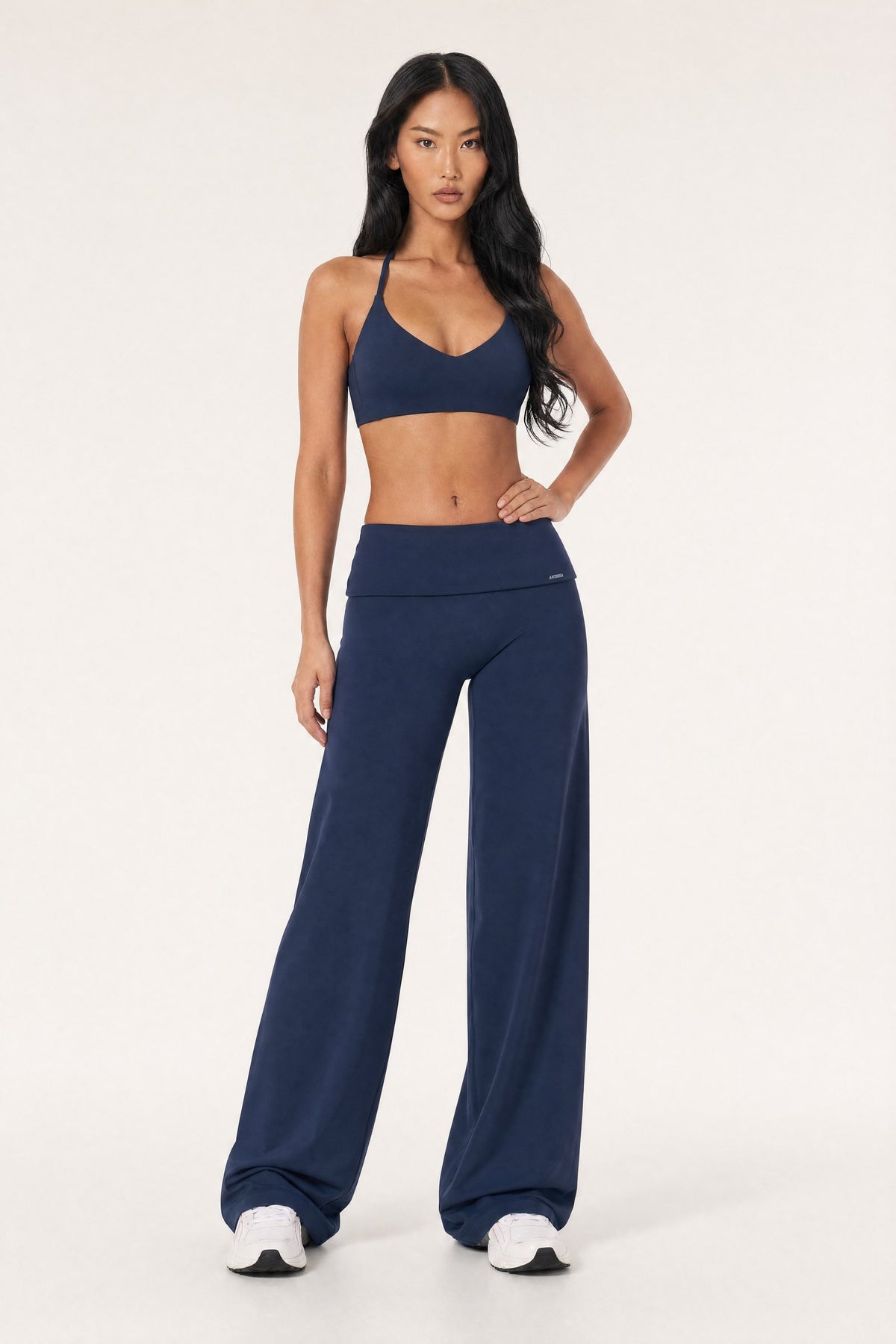 Model wearing the Fold Over Flare Pants Midnight