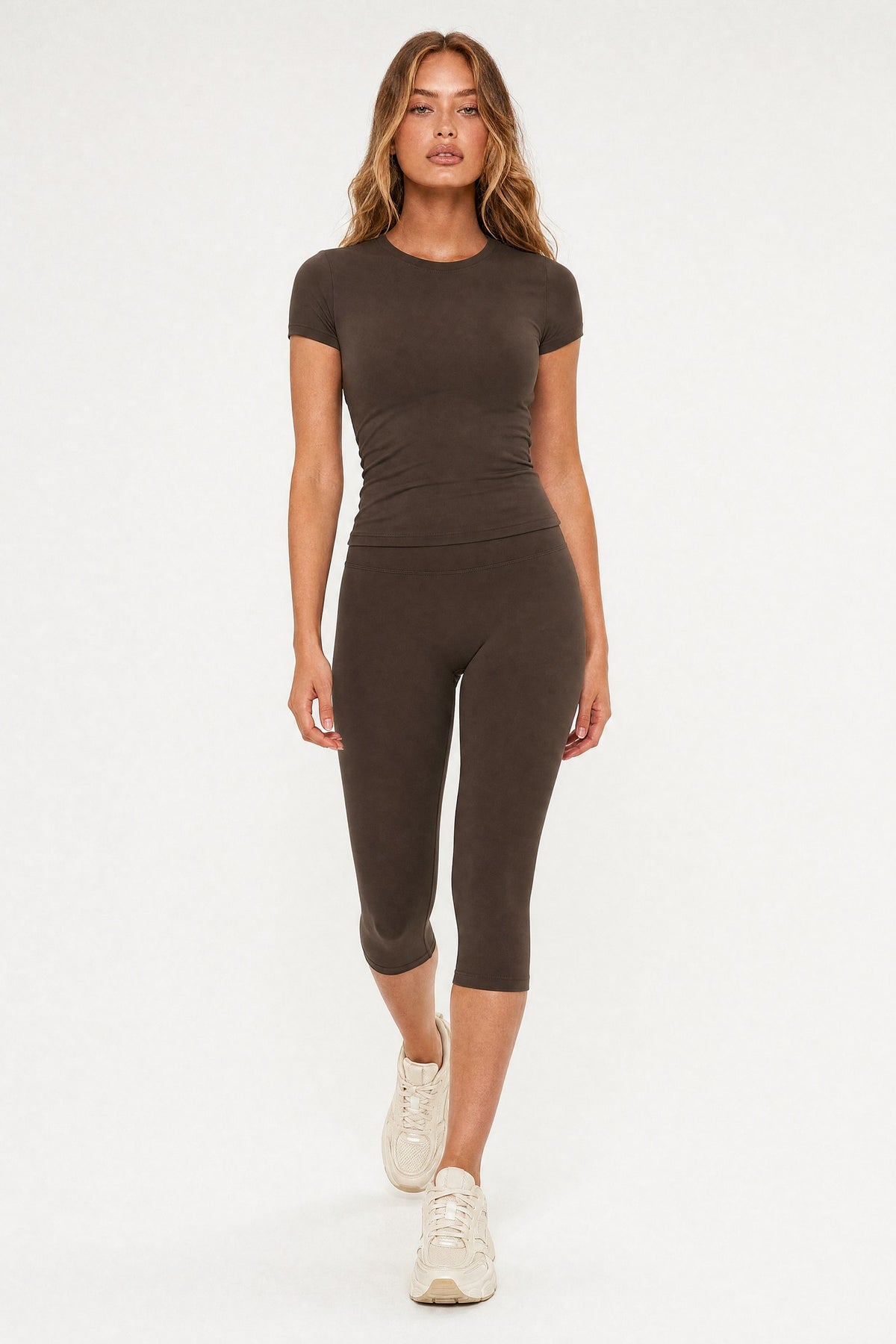Model wearing the Capri Leggings Ganache