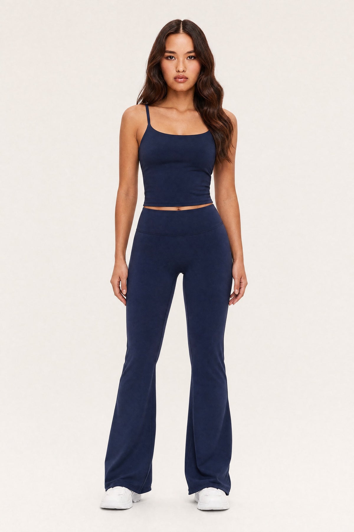 Model wearing the Flare Leggings Midnight