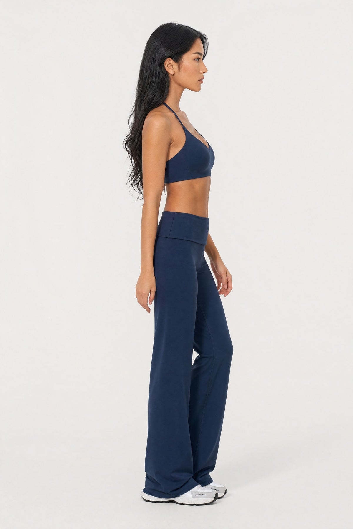 Fold Over Flare Pants Midnight, side view on model
